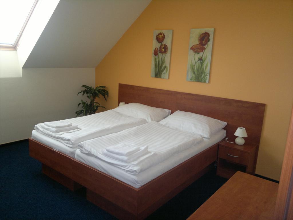 Luxusní třílůžkový pokoj